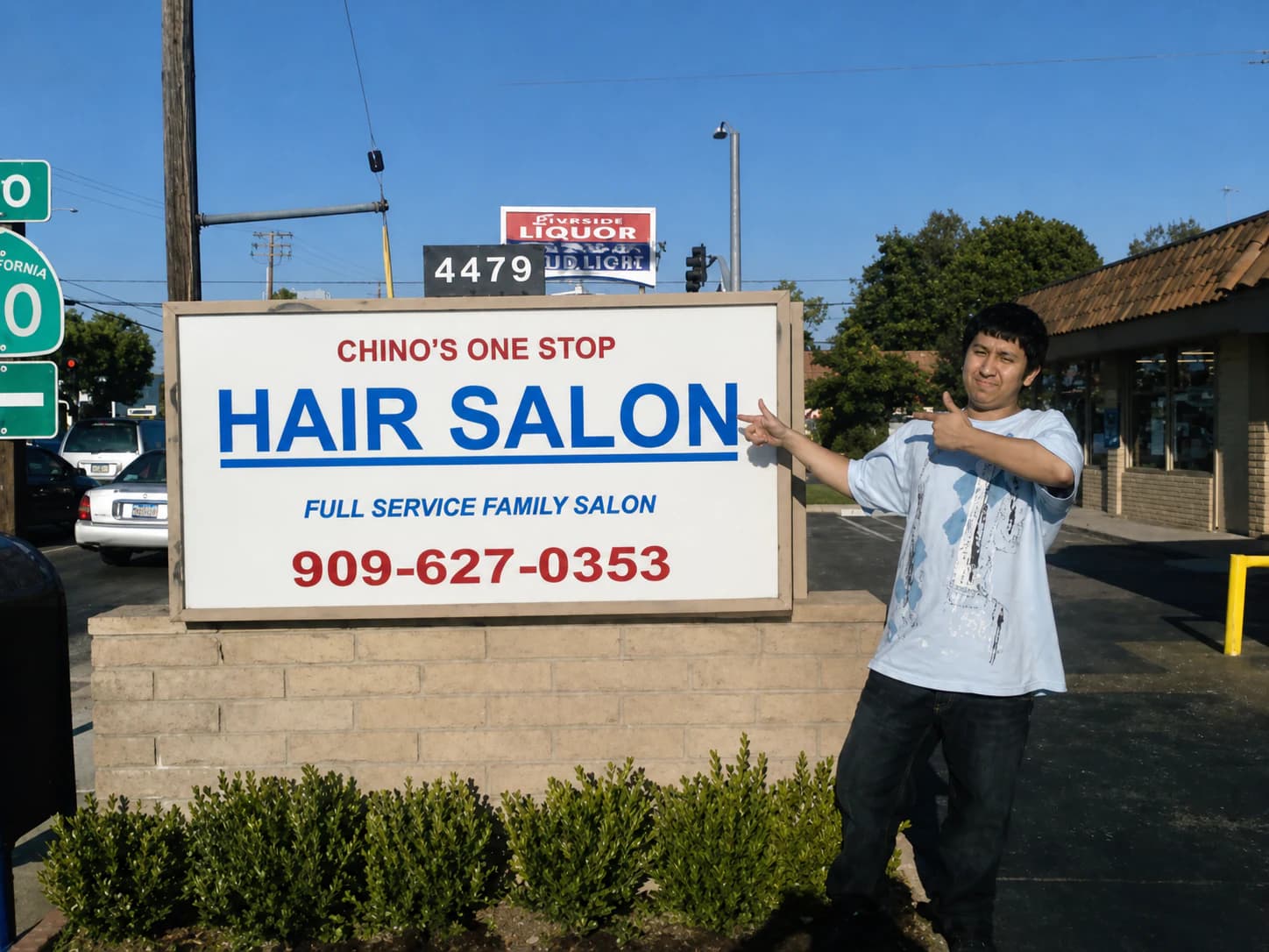 The storefront sign for Chino's One Stop Hair Salon on Riverside Drive