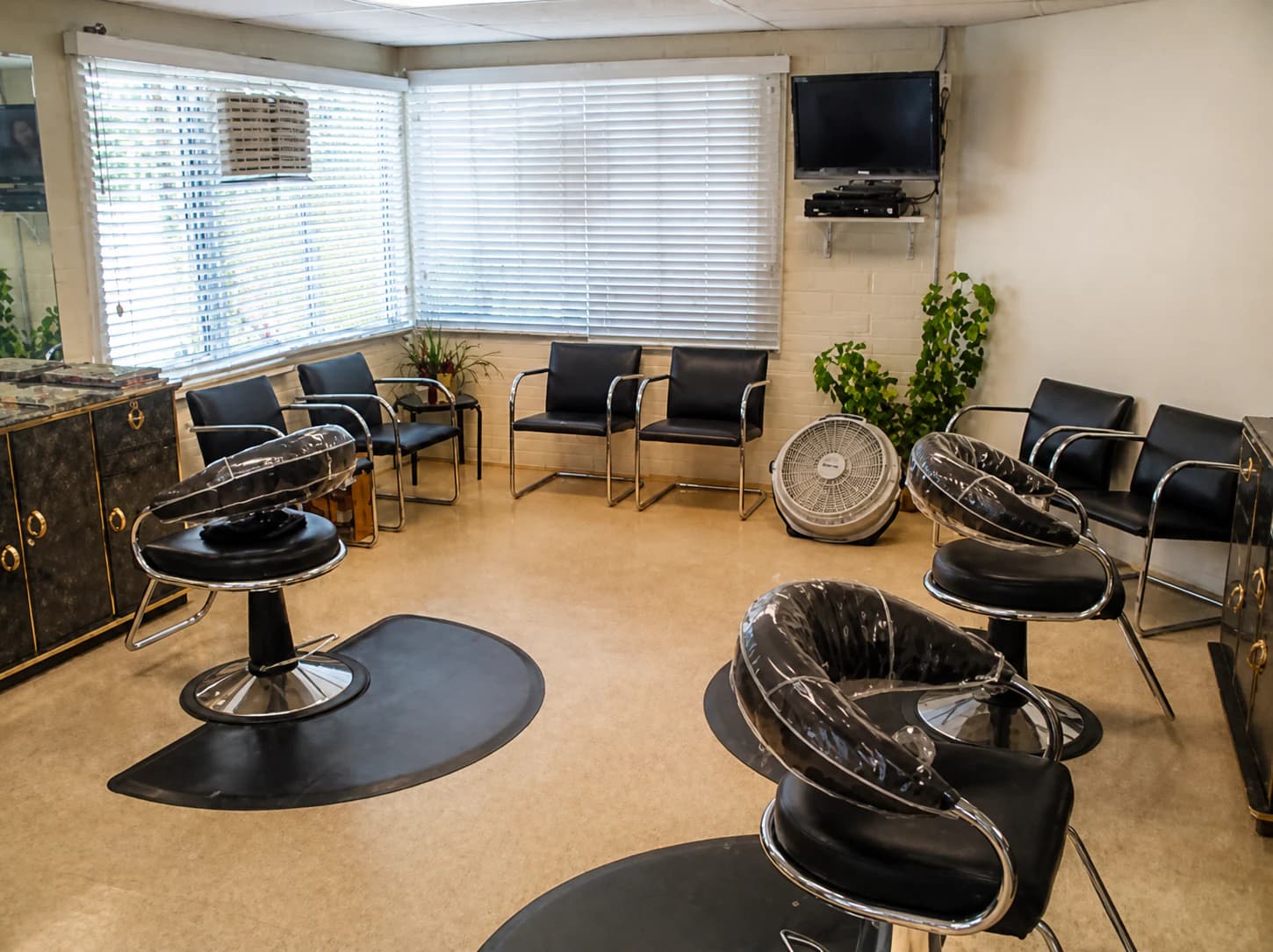 Waiting area at Chino's One Stop Hair Salon
