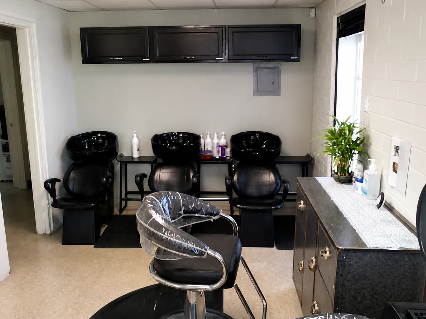 Wash basins at Chino's One Stop Hair Salon